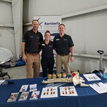 Kambeitz Chiropractic staff and doctors at a local business' open house